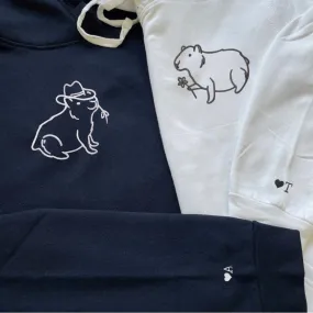Cowboy & Gentle Capybara Matching Couple Sweatshirts - Personalized Embroidered Sweatshirts For Couples
