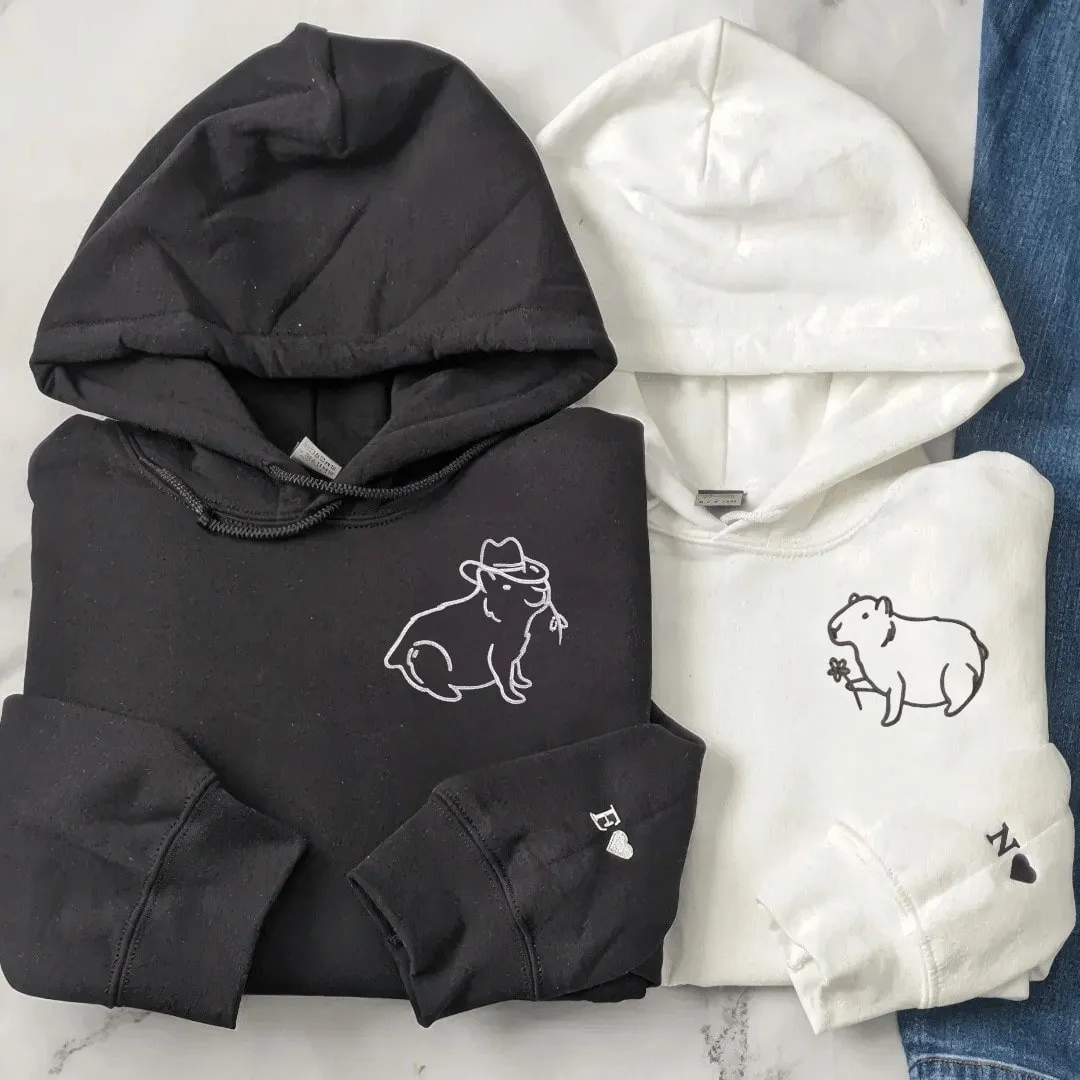 Cowboy & Gentle Capybara Matching Couple Sweatshirts - Personalized Embroidered Sweatshirts For Couples