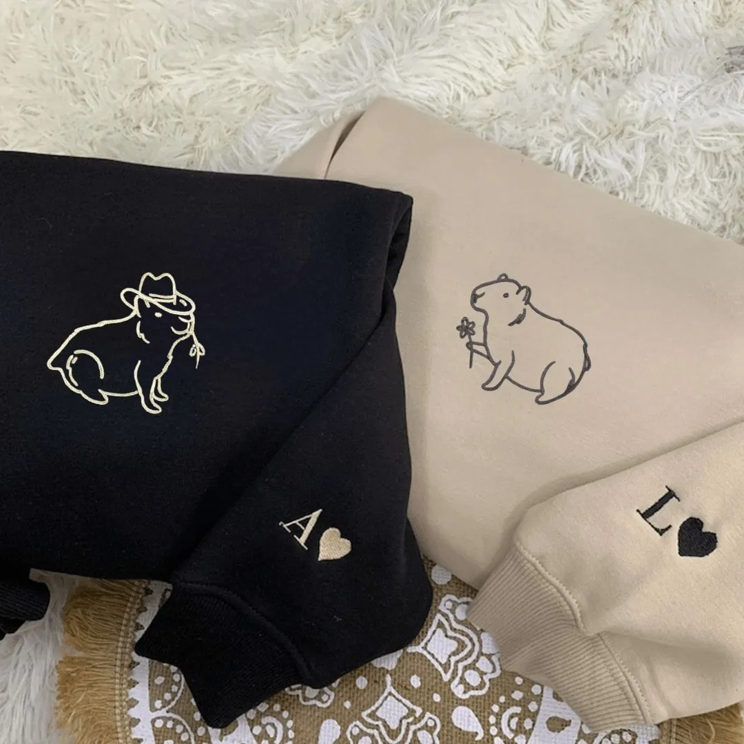 Cowboy & Gentle Capybara Matching Couple Sweatshirts - Personalized Embroidered Sweatshirts For Couples